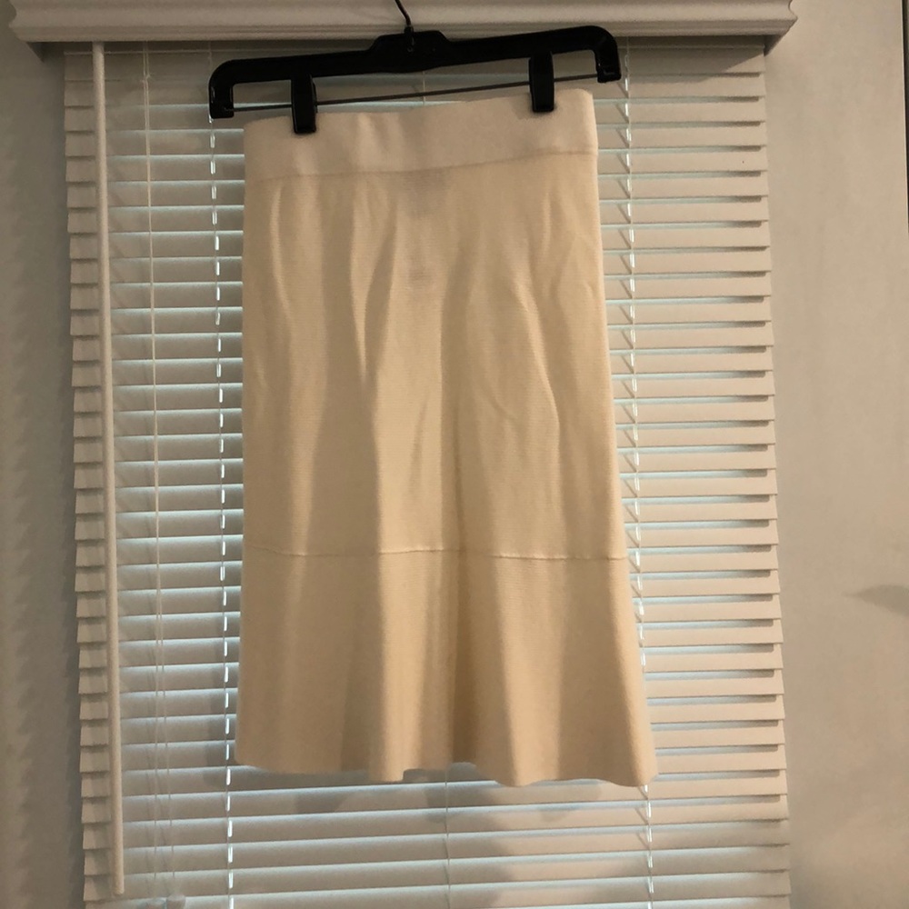 Cream skirt, mid-length